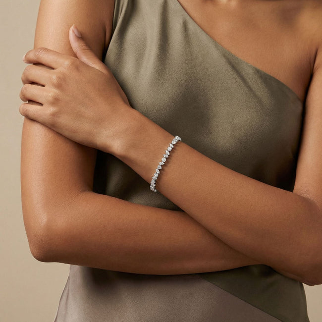 Multi shape tennis bracelet on wrist