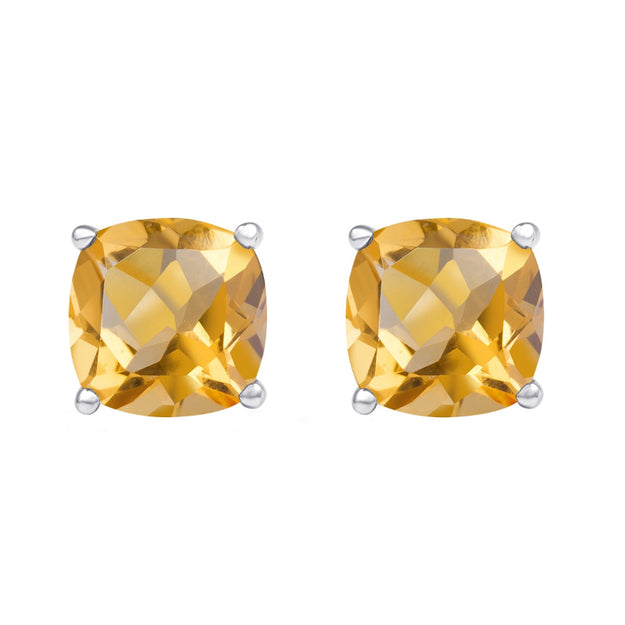 Pair of yellow gemstone earrings on a white background